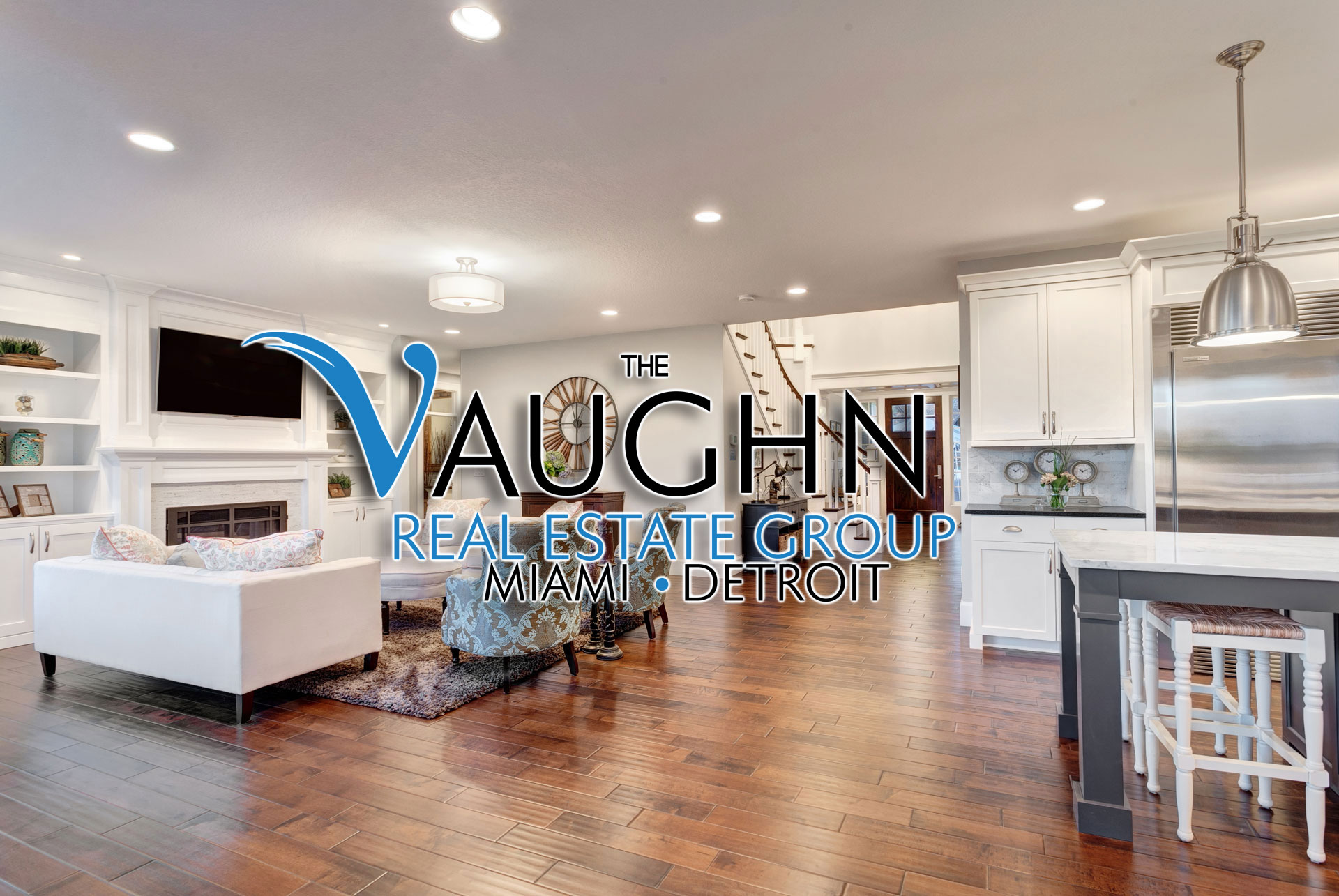 The Vaughn Real Estate Group Logo on top of luxury Michigan home interior