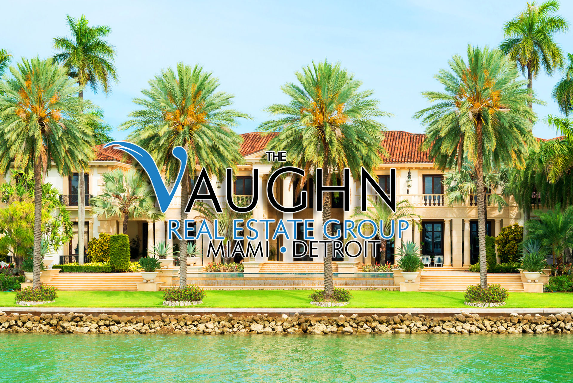 The Vaughn Real Estate Group Logo on top of luxury Miami home with palm trees